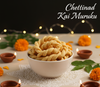 Bowl of Chettinad Kai Muruku with decorative elements on a dark background